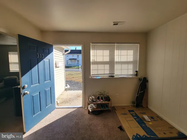 a room with furniture and a window