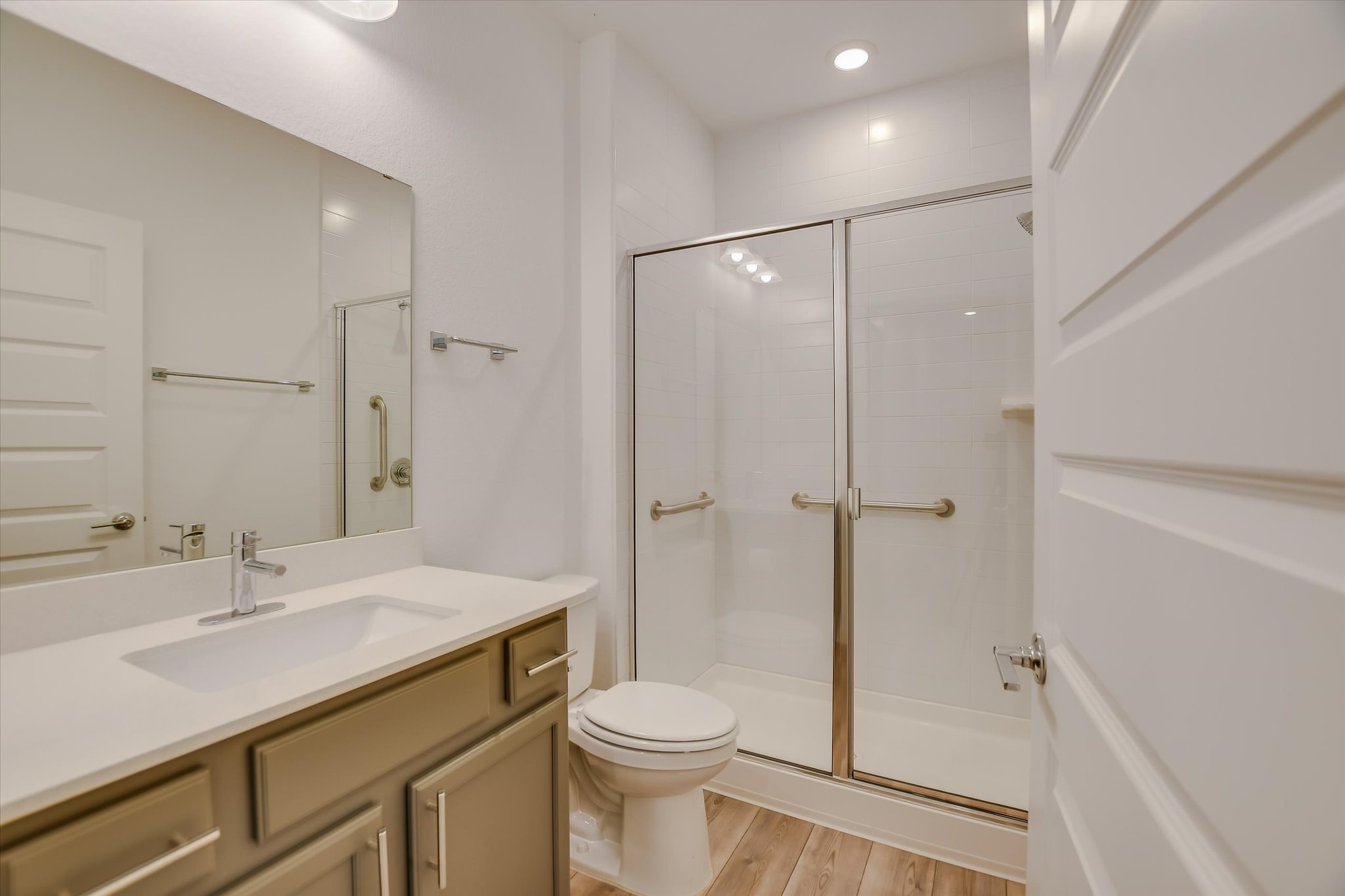 702 Kitty Hawk Road Georgetown, TX 78633 - Photo 15 of 20 a bathroom with a sink toilet and shower