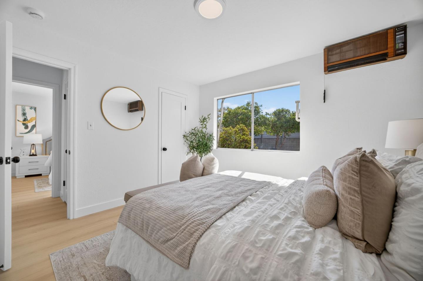 1236 Whitton Avenue San Jose, CA 95116 - Photo 18 of 30 a bedroom with a bed and a window