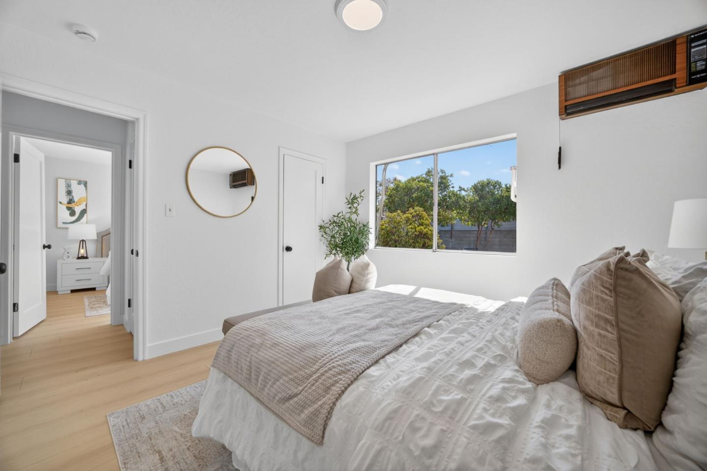 1236 Whitton Avenue San Jose, CA 95116 - Photo 19 of 30 a bedroom with a bed and a window