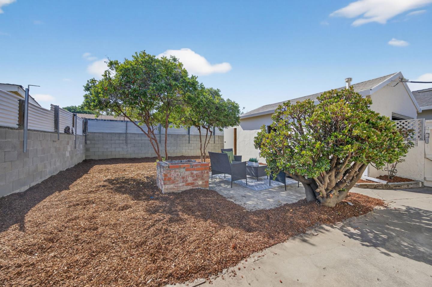 1236 Whitton Avenue San Jose, CA 95116 - Photo 25 of 30 a view of a backyard