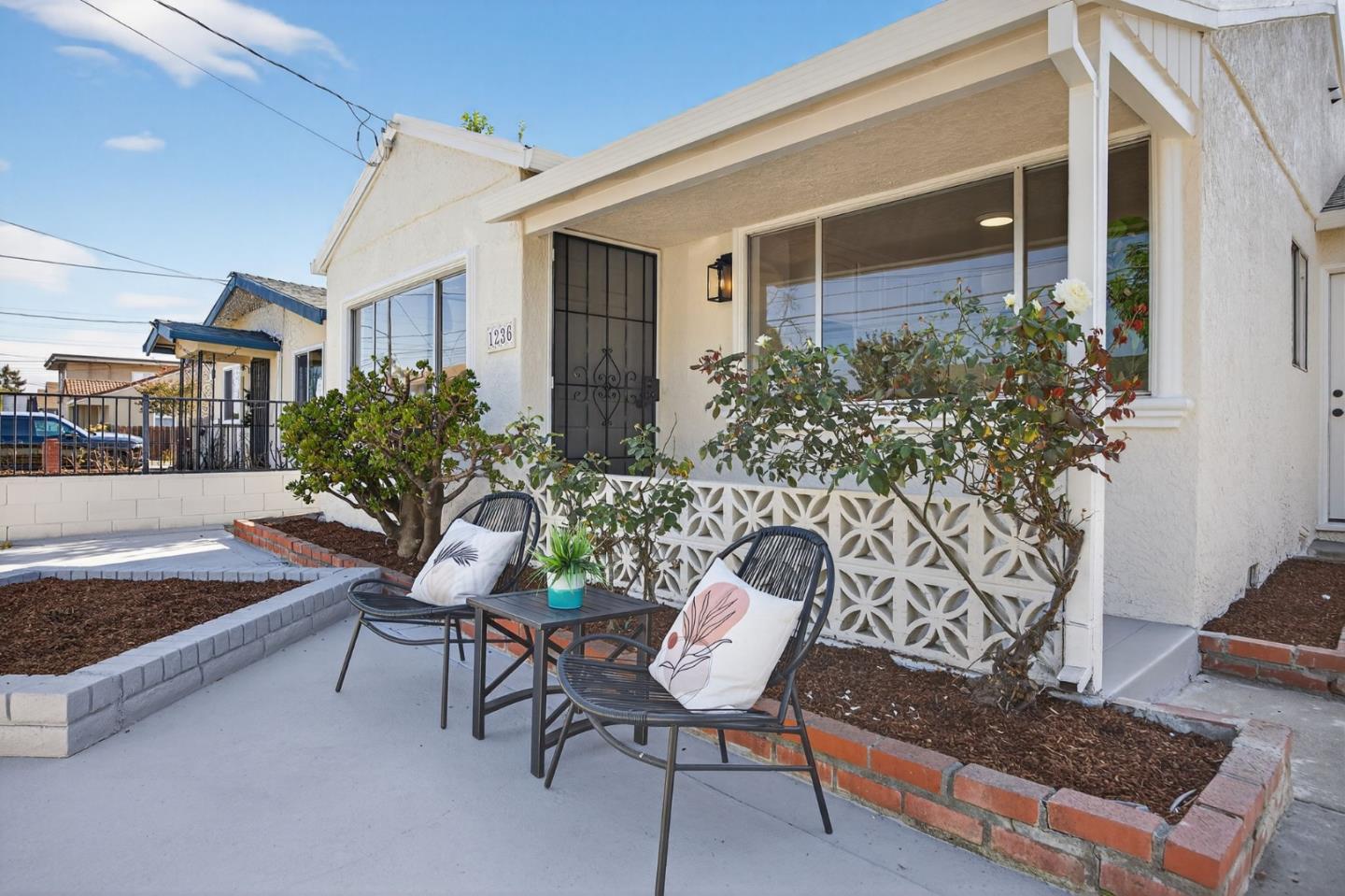 1236 Whitton Avenue San Jose, CA 95116 - Photo 27 of 30 a outdoor space with a couch and chairs