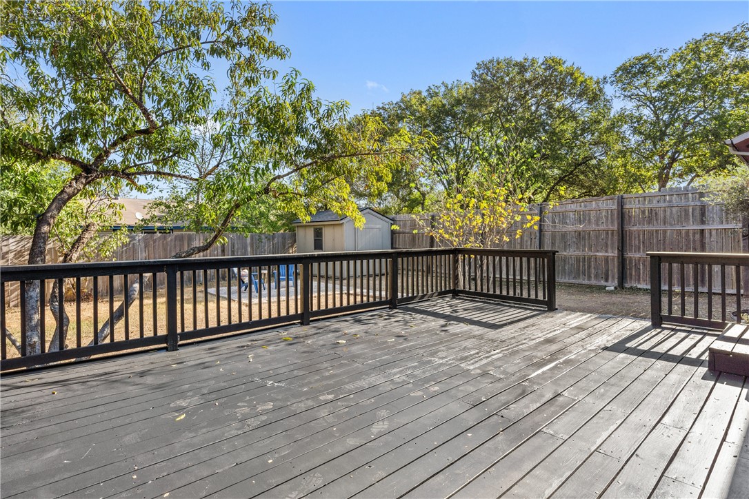 3808 Leafield Drive Austin, TX 78749 - Photo 31 of 31 a balcony with wooden floor and trees
