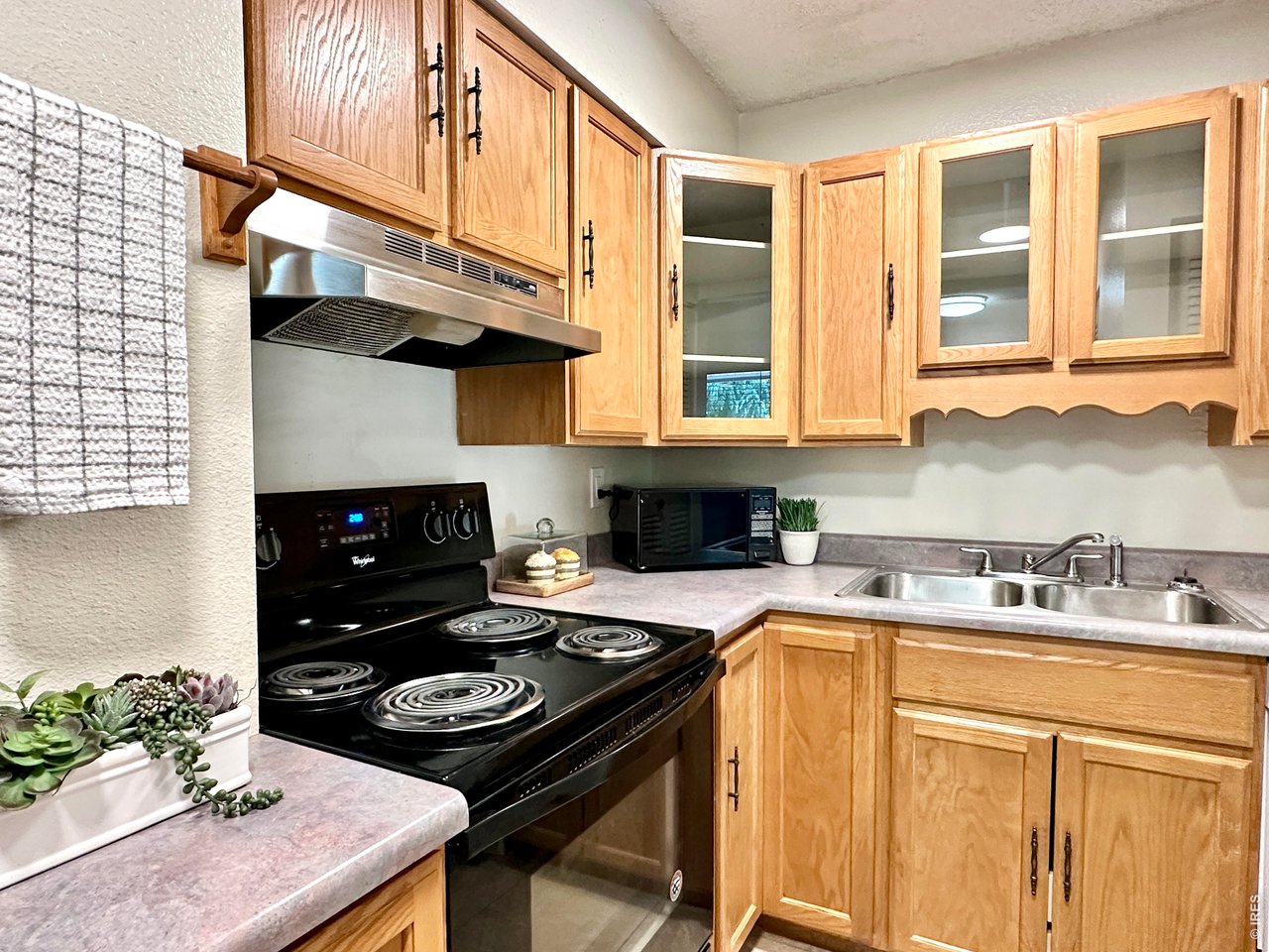 1705 Heatheridge Road, Unit 205 Fort Collins, CO 80526 - Photo 5 of 17 Plenty of cabinet space in the kitchen