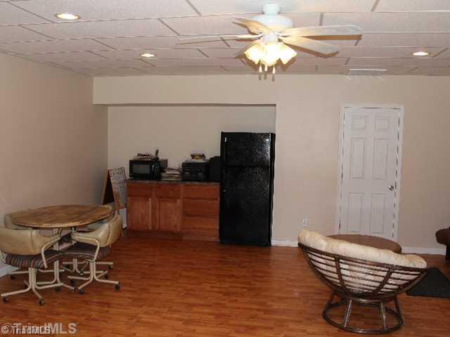 685 Sandy Cross Road Reidsville, NC 27320 - Photo 12 of 15 Den/Family/Great Room. Basement - Family room and kitchenette