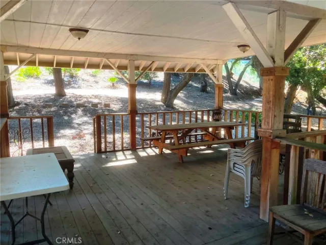 a view of swimming pool with outdoor seating