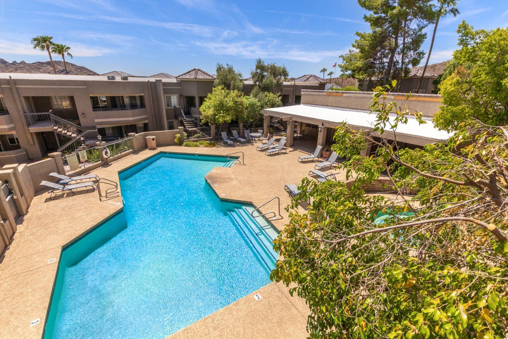 1720 East Thunderbird Road, Unit 1086 Phoenix, AZ 85022 - Photo 25 of 32 a view of a swimming pool with a patio