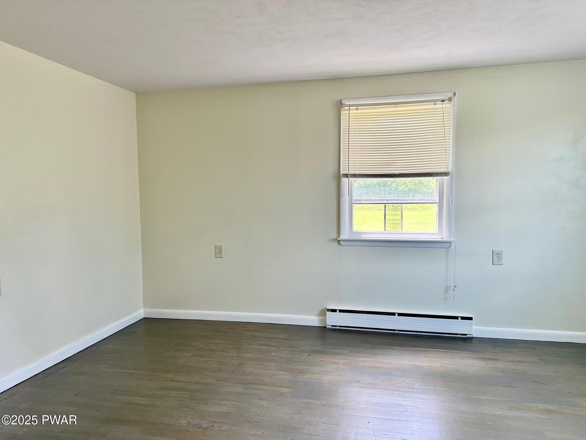 191 Hemlock Grove Road Greentown, PA 18426 - Photo 25 of 31 a view of a room with wooden floor and window