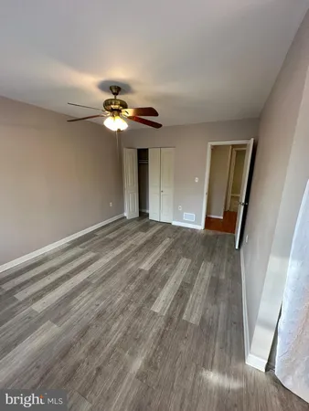 a view of a hallway with washer and dryer