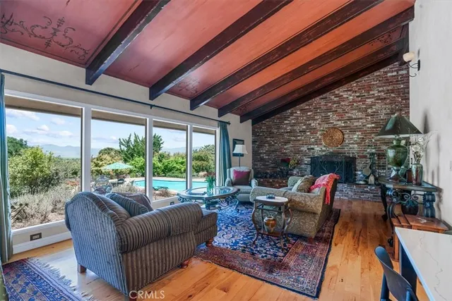 a view of a fireplace with a potted plant