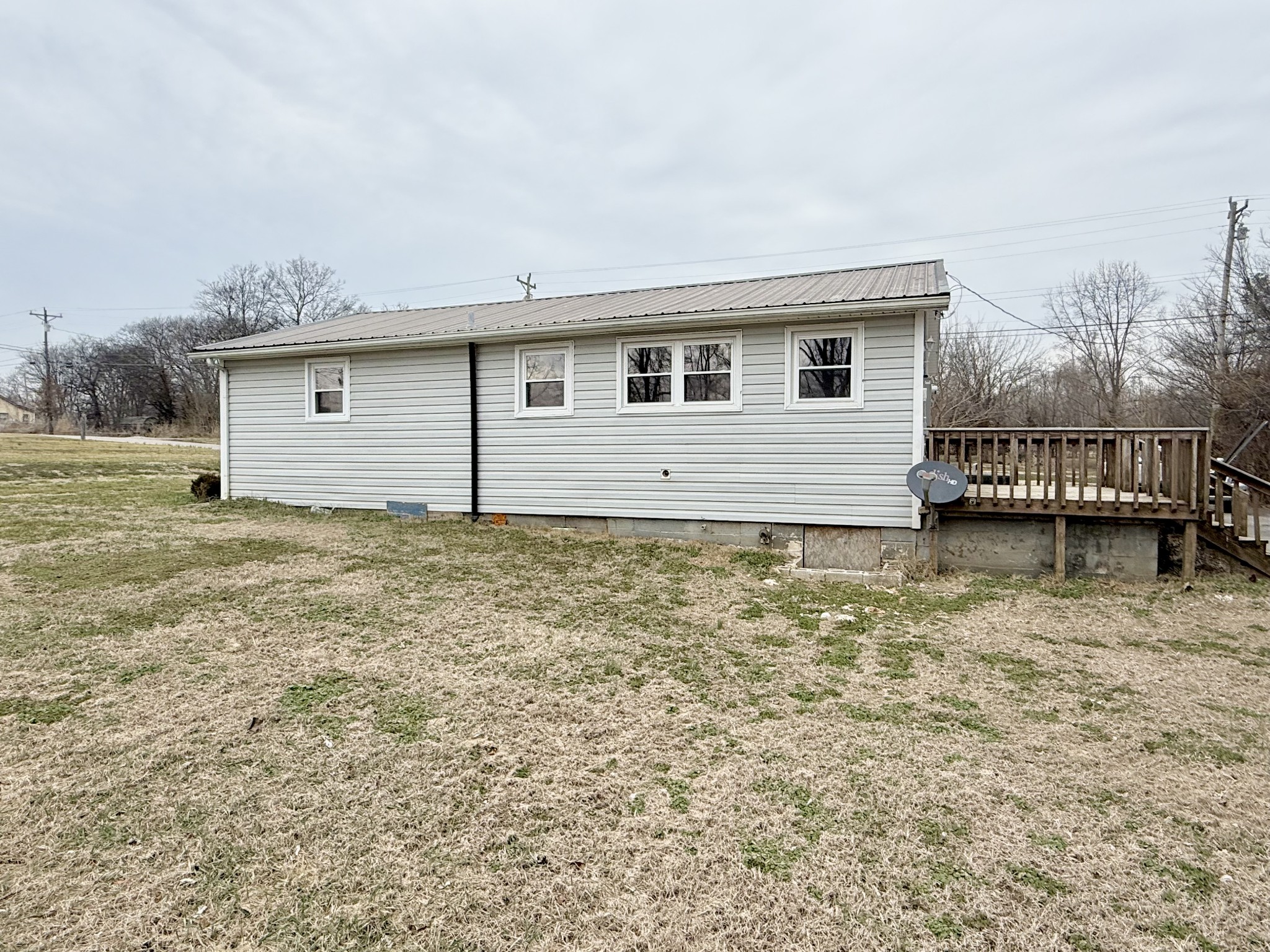 141 Main Street Gracey, KY 42232 - Photo 15 of 16 a house that has a lot of plants in it