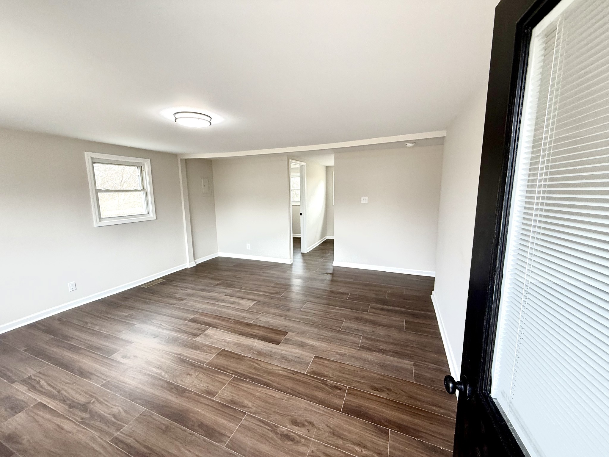 141 Main Street Gracey, KY 42232 - Photo 2 of 16 a view of empty room with wooden floor