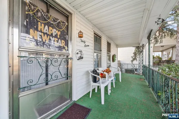 a view of porch with seating area