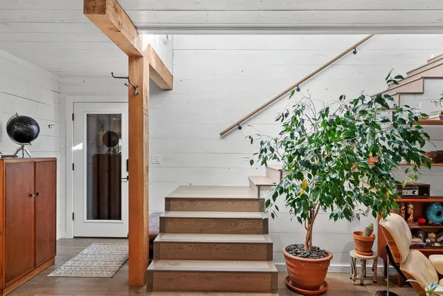 a house that has a potted plant on it