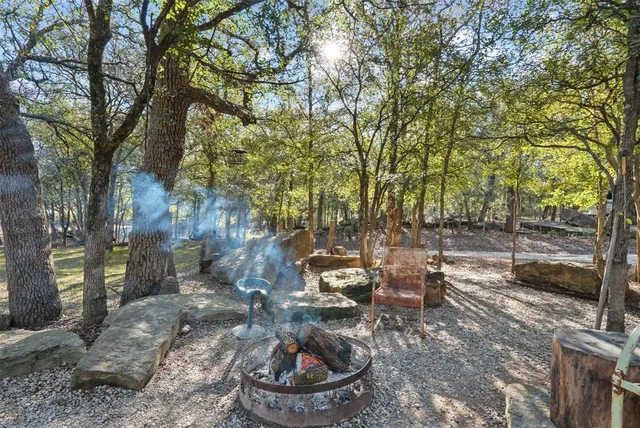 a view of a house with a tree