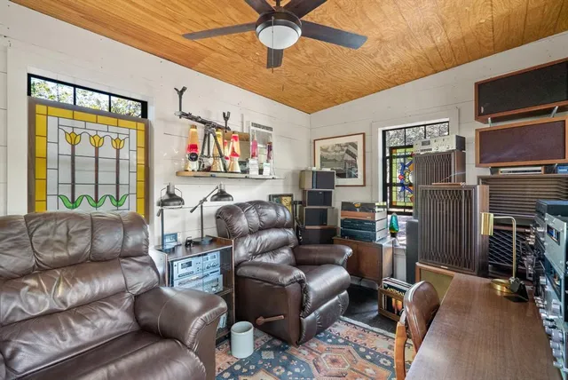 a view of a house with a yard and garage