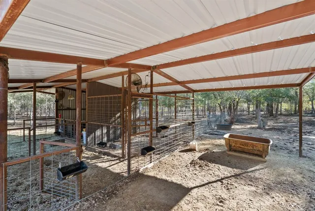 a view of outdoor space with lots of trees