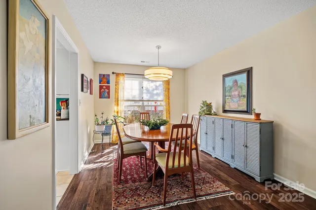 a bedroom with bed and wooden furniture
