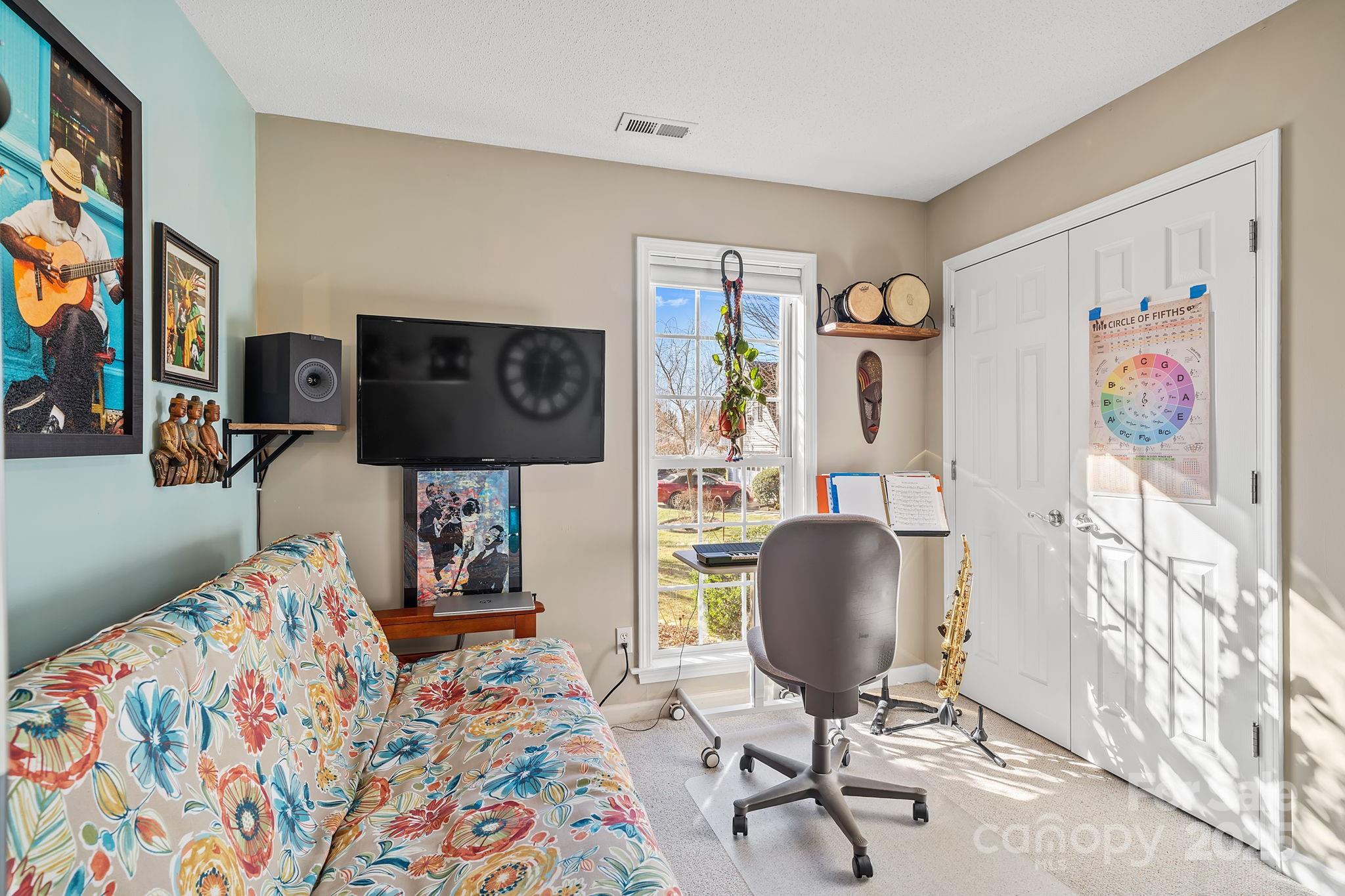 28 Sand Pebble Court Fletcher, NC 28732 - Photo 22 of 35 a view of a workspace with furniture and toys