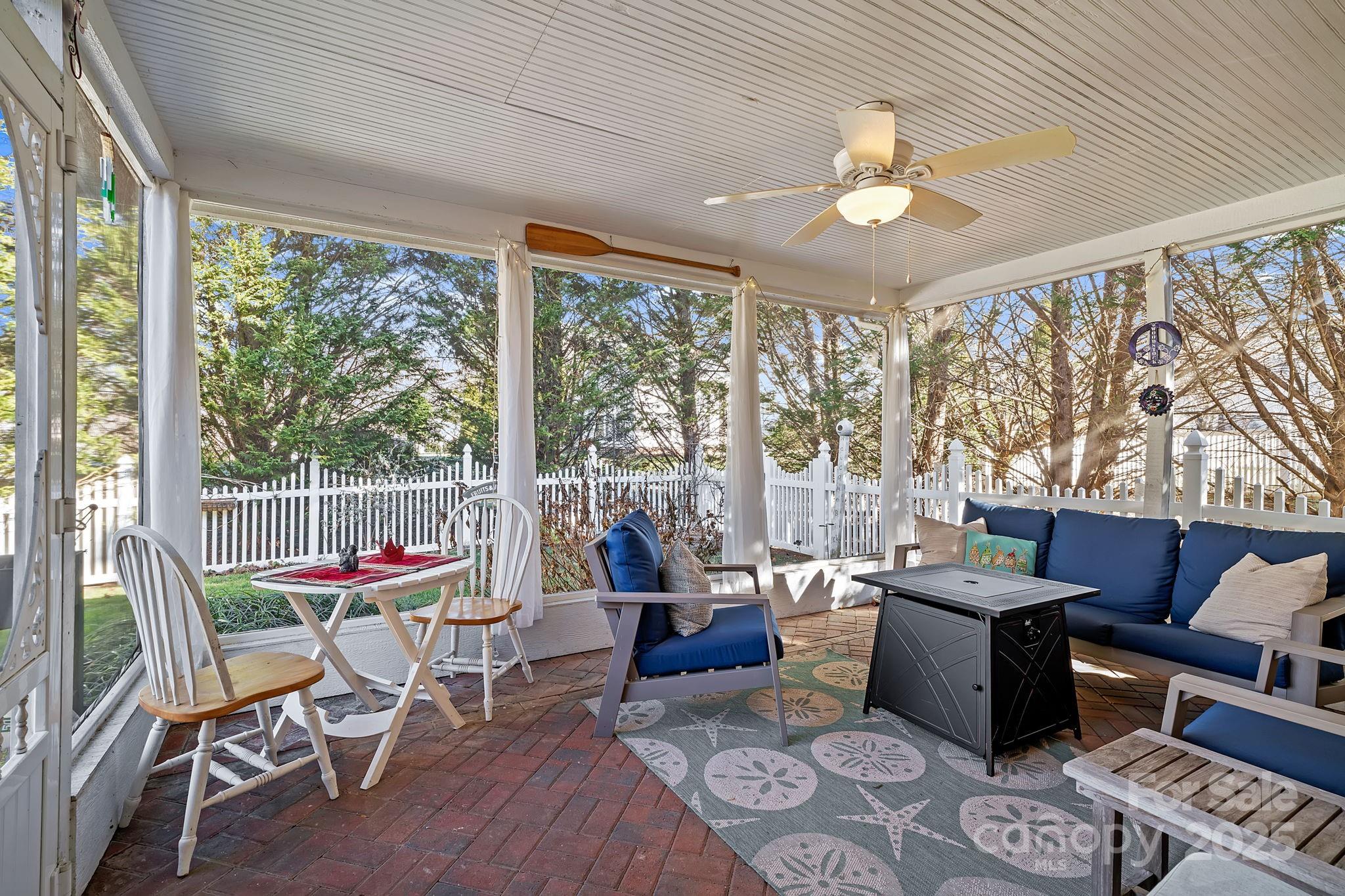 28 Sand Pebble Court Fletcher, NC 28732 - Photo 27 of 35 a living room with furniture and a large window