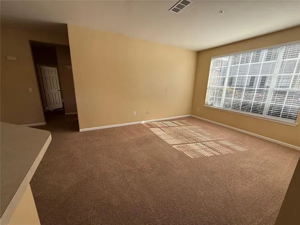 an empty room with windows