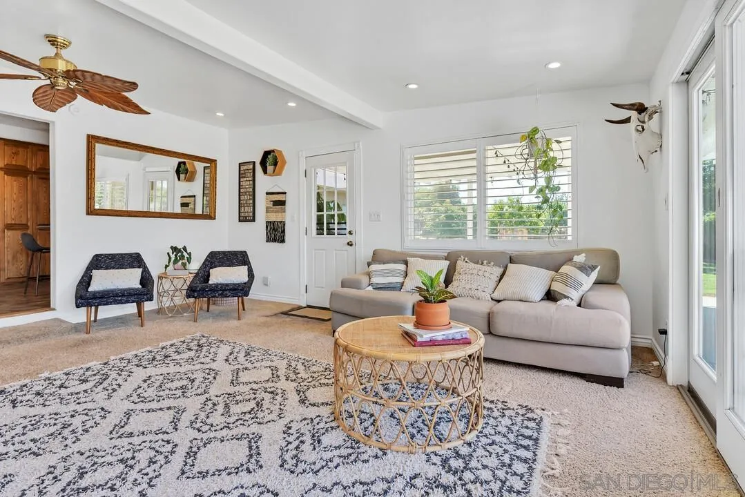1347 Rex Lane El Cajon, CA 92021 - Photo 18 of 57 a living room with furniture and wooden floor
