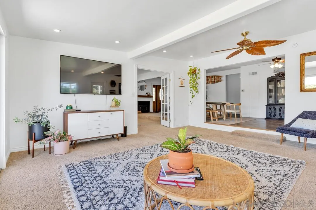 1347 Rex Lane El Cajon, CA 92021 - Photo 19 of 57 a living room with furniture and wooden floor