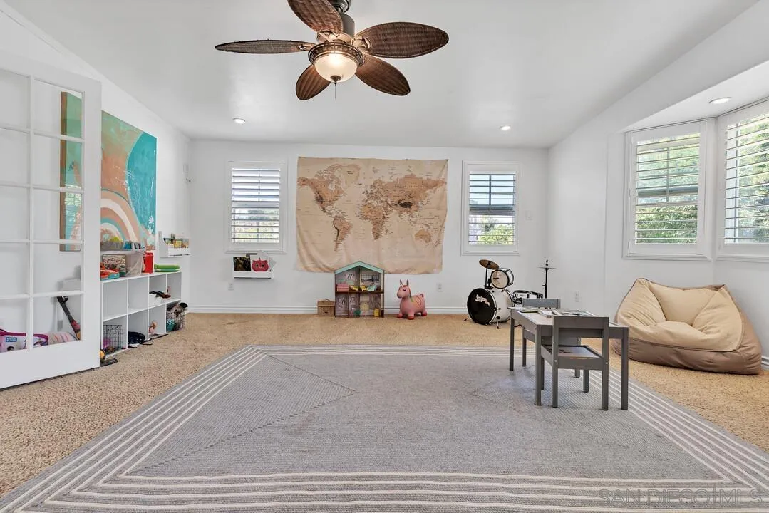 1347 Rex Lane El Cajon, CA 92021 - Photo 21 of 57 a view of a livingroom with furniture and a large window