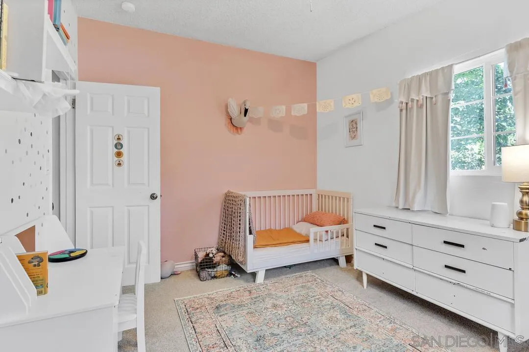 1347 Rex Lane El Cajon, CA 92021 - Photo 27 of 57 a bedroom with furniture and a window