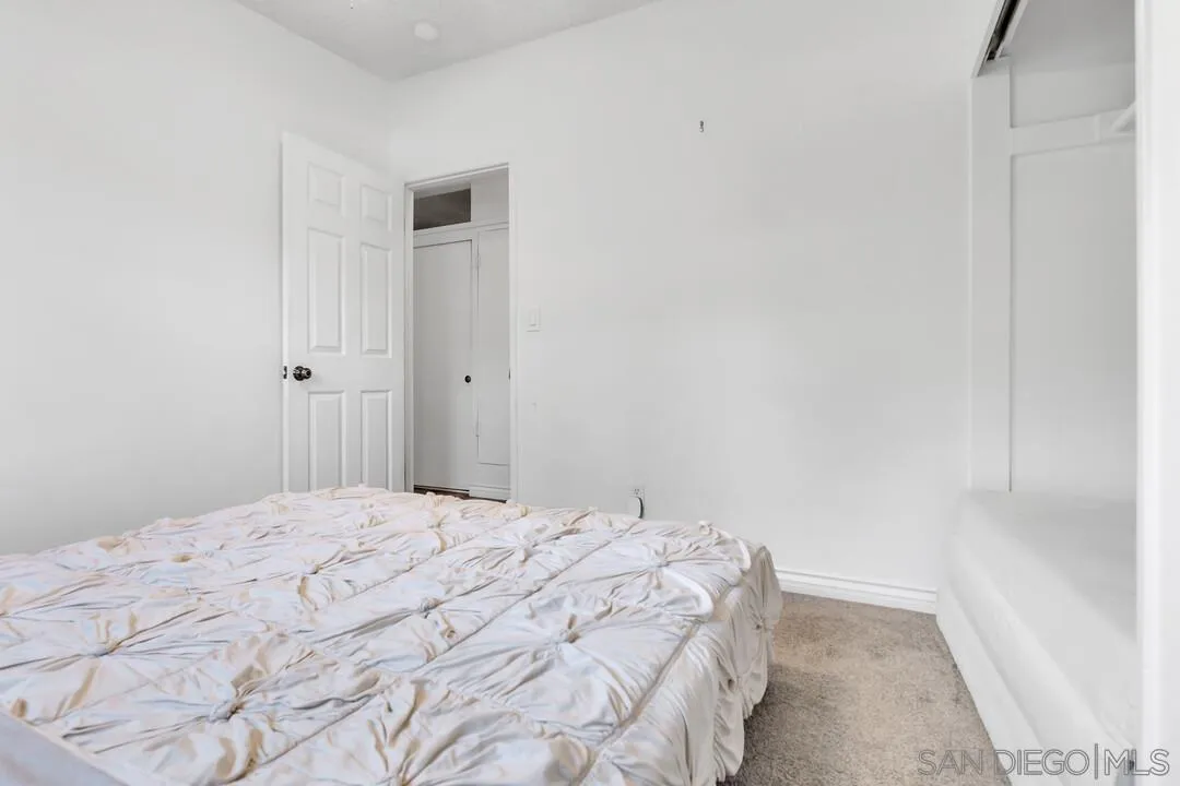 1347 Rex Lane El Cajon, CA 92021 - Photo 29 of 57 a bedroom with a bed