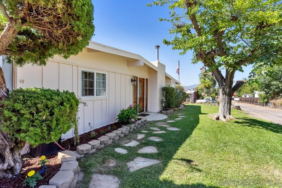 1347 Rex Lane El Cajon, CA 92021 - Photo 3 of 57 a front view of a house with garden