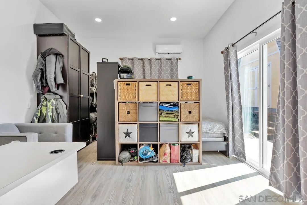 1347 Rex Lane El Cajon, CA 92021 - Photo 44 of 57 a view of walk in closet with clothes and shoes