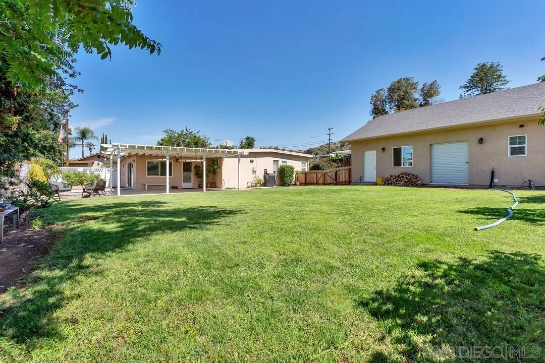 1347 Rex Lane El Cajon, CA 92021 - Photo 48 of 57 a view of a house with a yard and sitting area