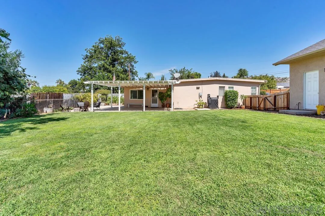 1347 Rex Lane El Cajon, CA 92021 - Photo 53 of 57 a view of a house with a yard and sitting area