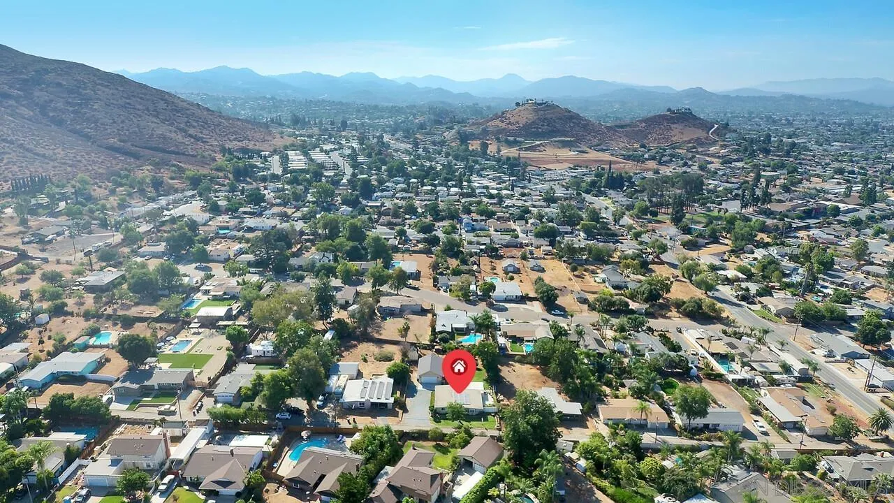 1347 Rex Lane El Cajon, CA 92021 - Photo 55 of 57 an aerial view of residential houses with outdoor space and trees