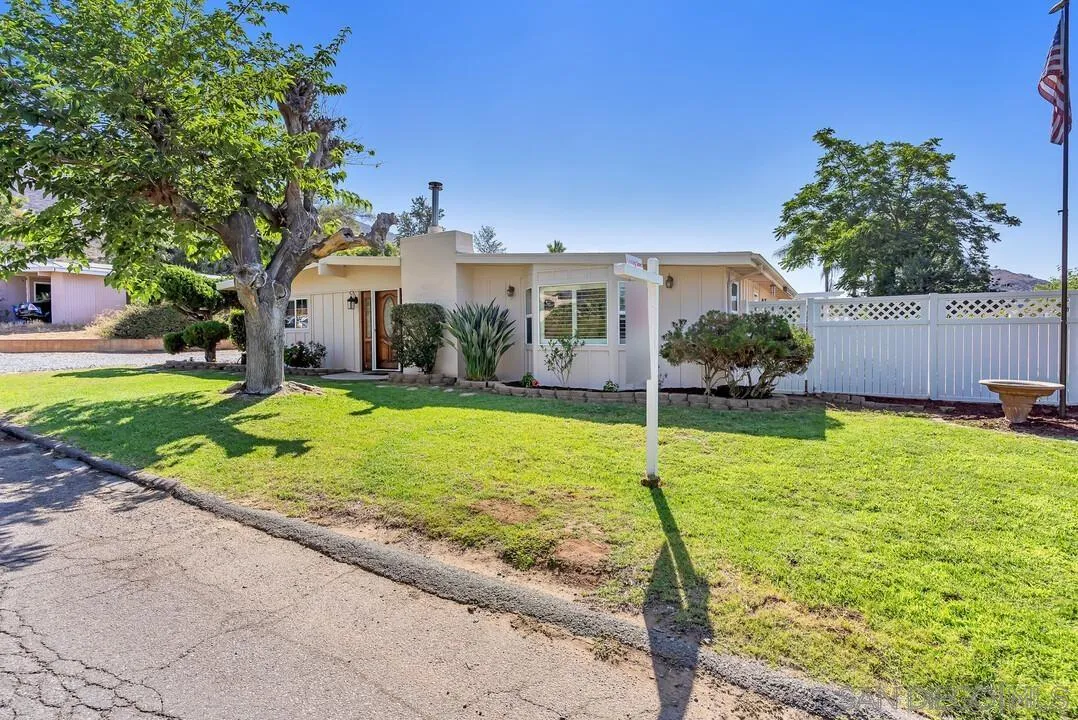 1347 Rex Lane El Cajon, CA 92021 - Photo 6 of 57 a view of a house with a yard