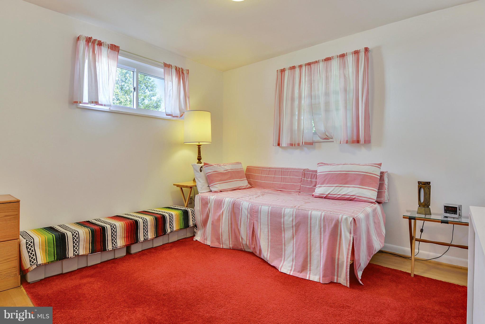 11113 Lombardy Road Silver Spring, MD 20901 - Photo 15 of 30 a bedroom with beds and a night stand