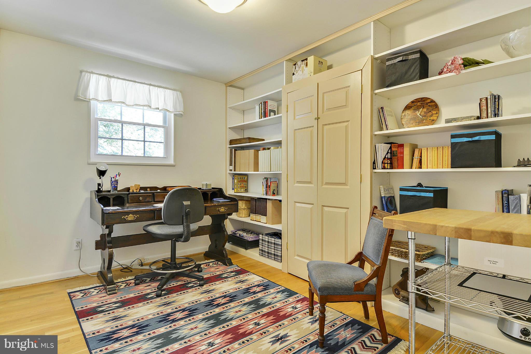 11113 Lombardy Road Silver Spring, MD 20901 - Photo 16 of 30 a view of a workspace with furniture and a window
