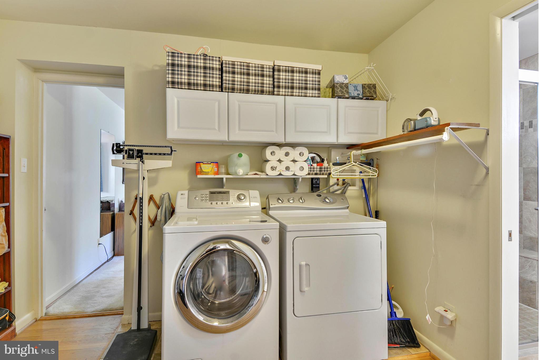 11113 Lombardy Road Silver Spring, MD 20901 - Photo 18 of 30 a utility room with dryer and washer