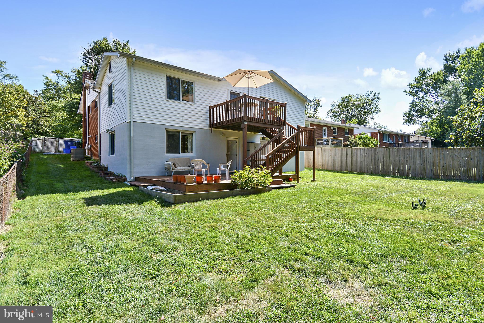 11113 Lombardy Road Silver Spring, MD 20901 - Photo 25 of 30 a front view of a house with garden