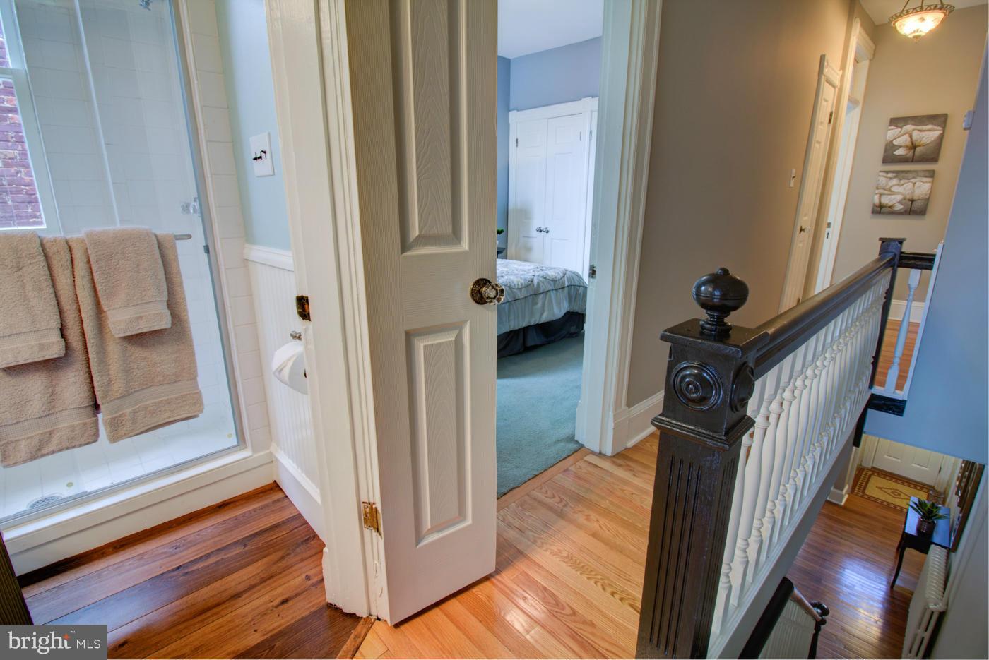 509 6th Street Northeast Washington, DC 20002 - Photo 20 of 30 a view of a hallway with wooden floor and staircase