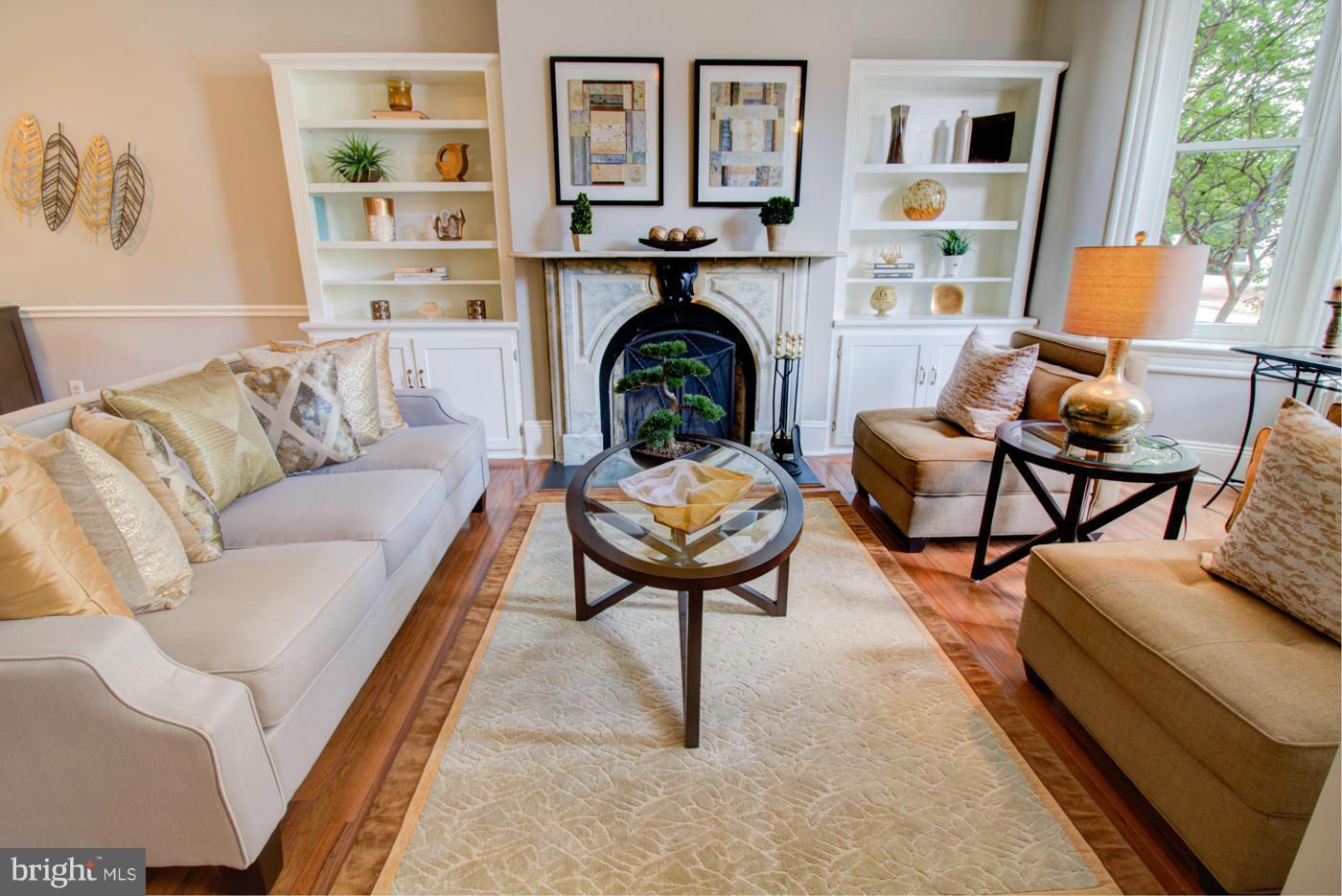 509 6th Street Northeast Washington, DC 20002 - Photo 3 of 30 a living room with furniture and a fireplace