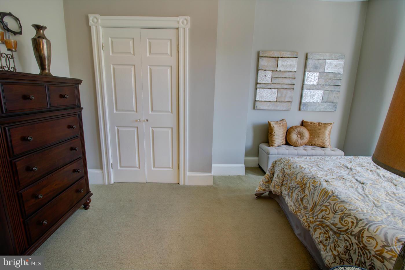 509 6th Street Northeast Washington, DC 20002 - Photo 26 of 30 a bedroom with a bed and a dresser