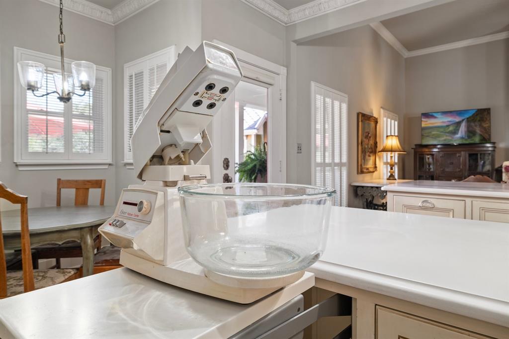 326 West Liberty Street Pilot Point, TX 76258 - Photo 16 of 40 a living room with furniture and a chandelier
