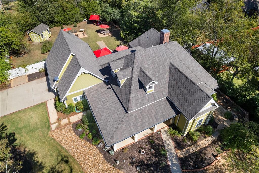 326 West Liberty Street Pilot Point, TX 76258 - Photo 40 of 40 an aerial view of a house with a yard and balcony
