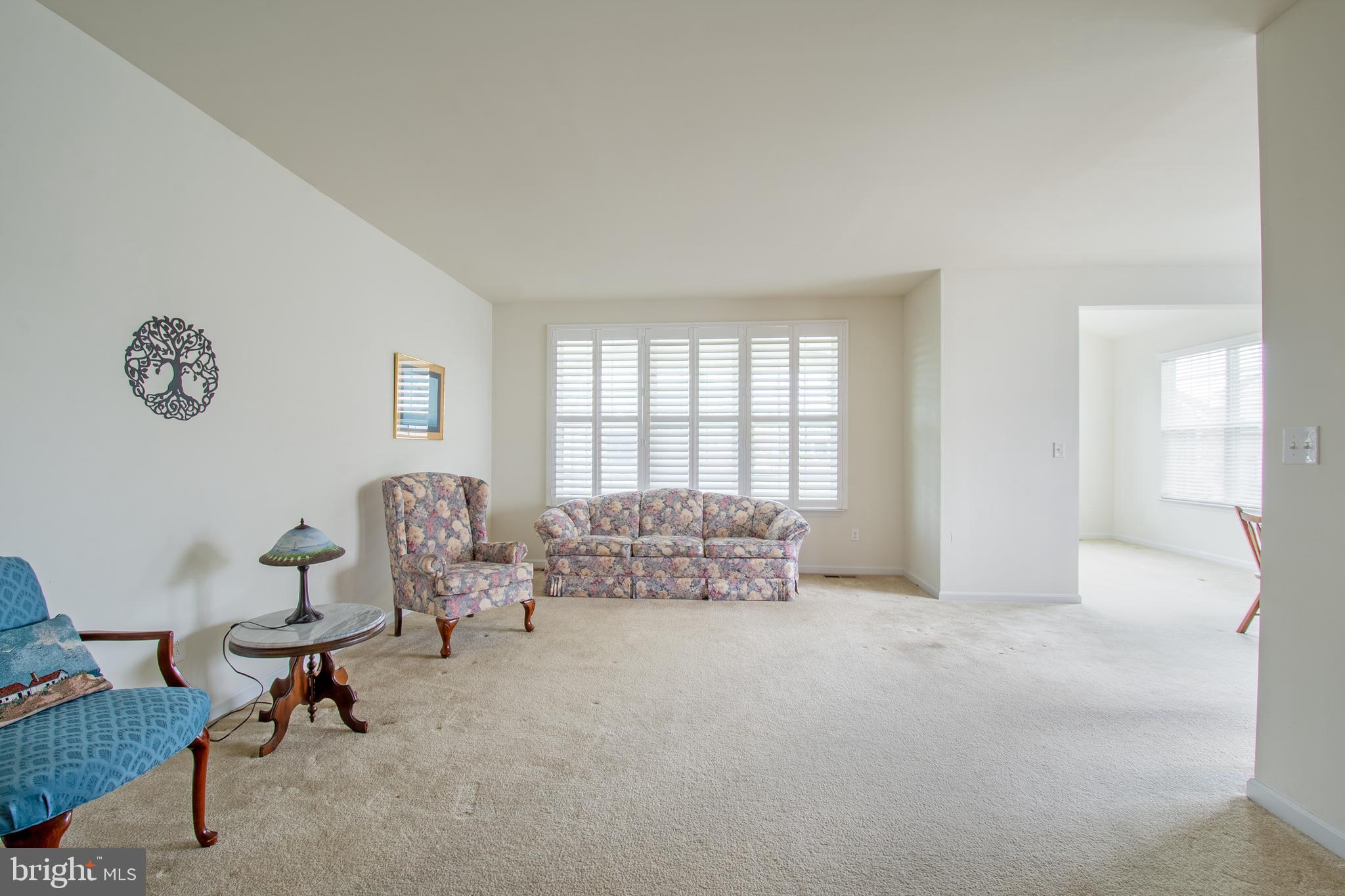85 Bay Hill Road Magnolia, DE 19962 - Photo 12 of 31 a living room with furniture and a window