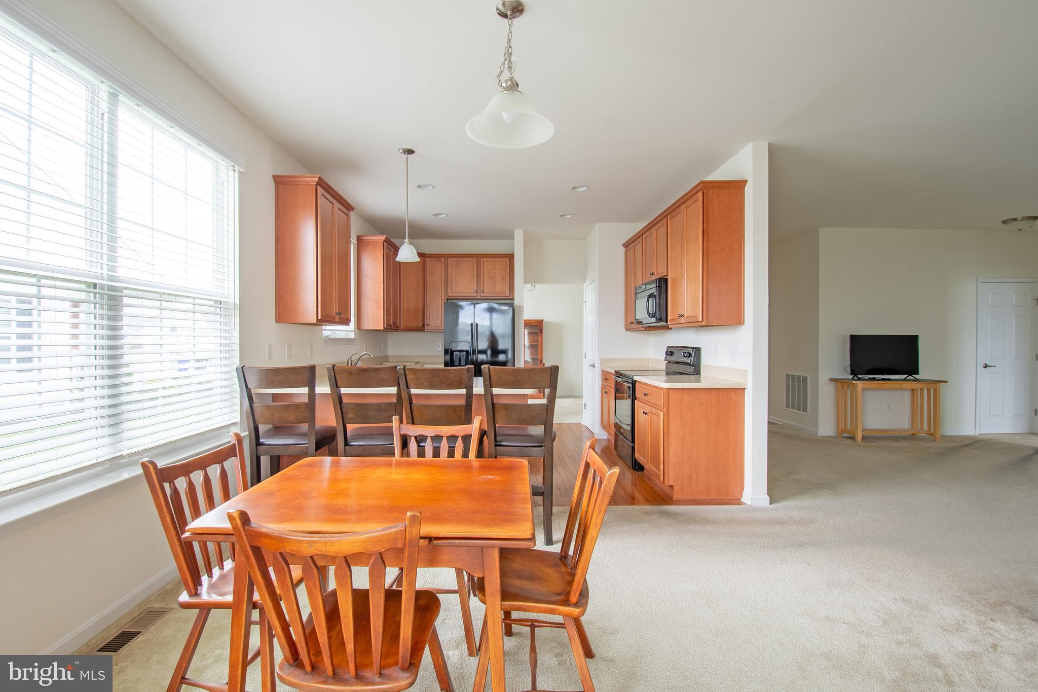 85 Bay Hill Road Magnolia, DE 19962 - Photo 18 of 31 a dining room with furniture and window