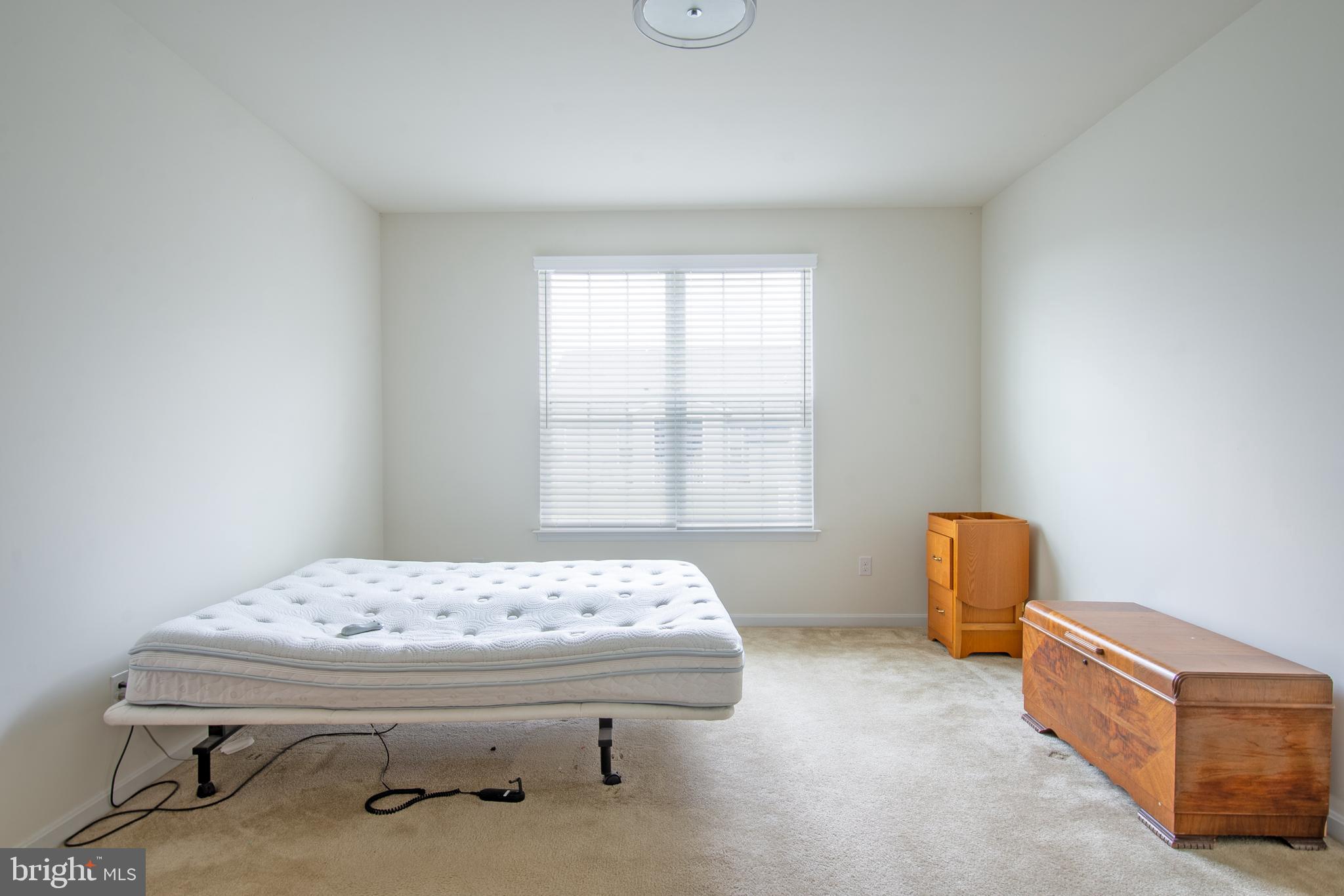 85 Bay Hill Road Magnolia, DE 19962 - Photo 21 of 31 a bedroom with a bed and a window