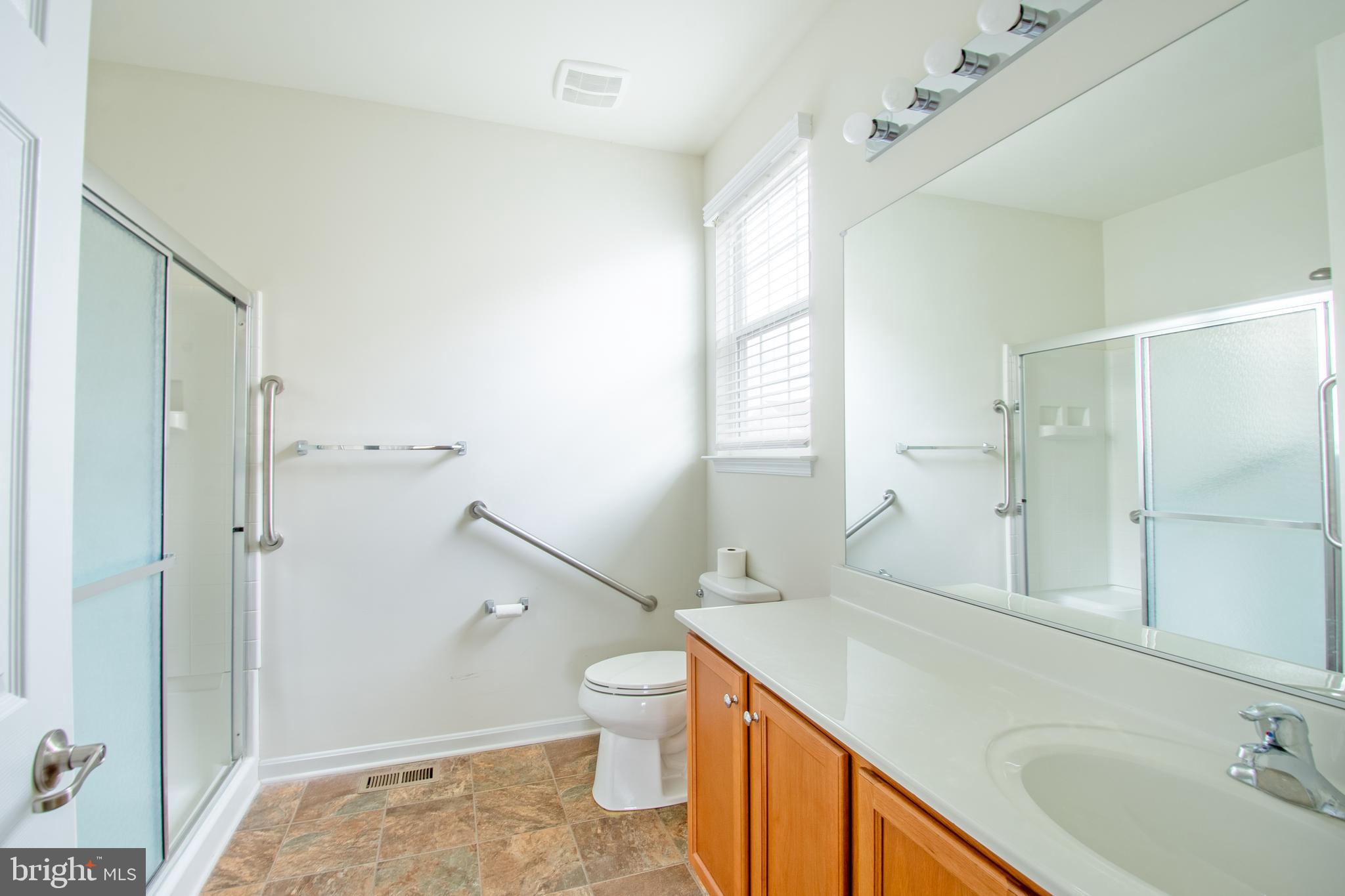 85 Bay Hill Road Magnolia, DE 19962 - Photo 23 of 31 a bathroom with a sink a toilet and shower