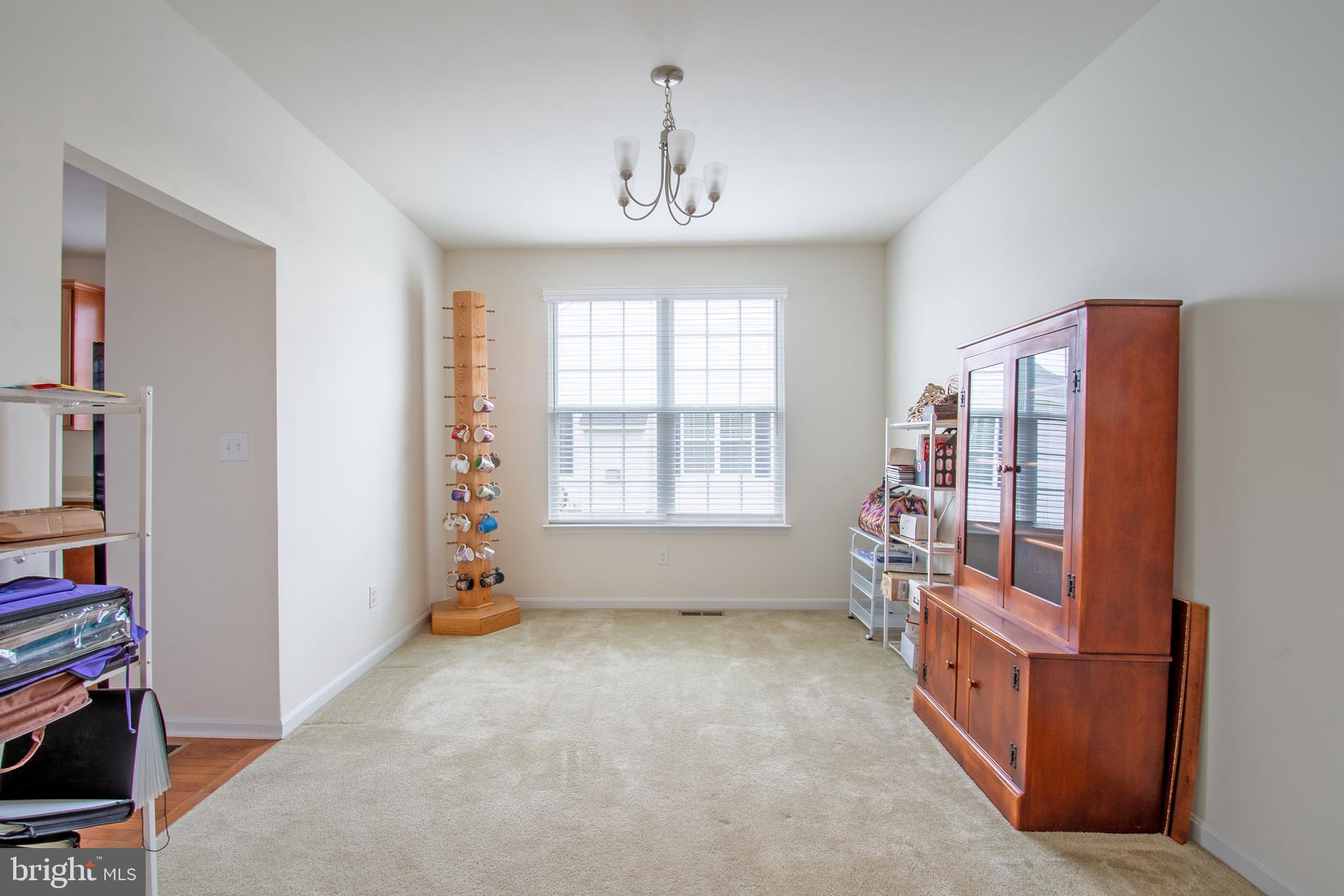 85 Bay Hill Road Magnolia, DE 19962 - Photo 8 of 31 wooden floor in an empty room with a window